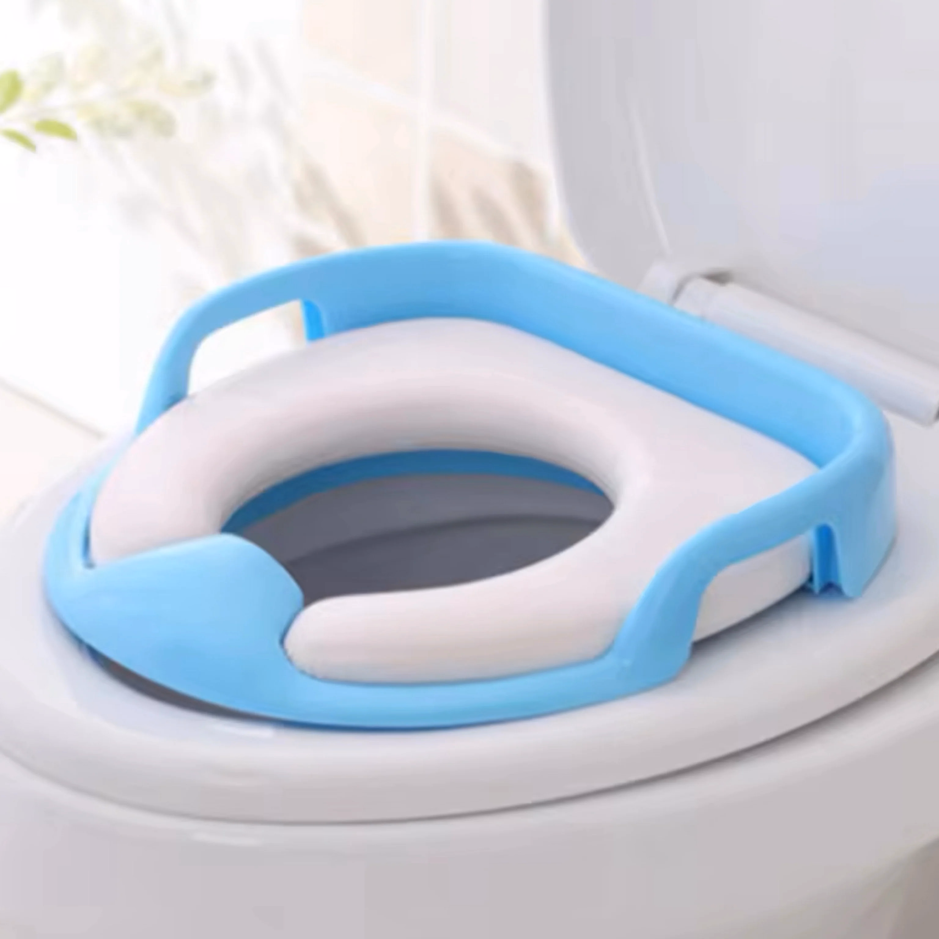 REDUCTOR DE BAÑO CON ASAS
